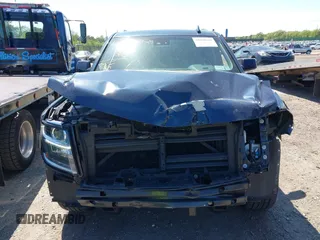 2020 Chevrolet Tahoe LT with VIN 1GNSKBKC6LR239081, listed as a IAAI auction lot 42298842 with 125,328 mi miles and . Bid and sale history available at DreamBid. Image 12.
