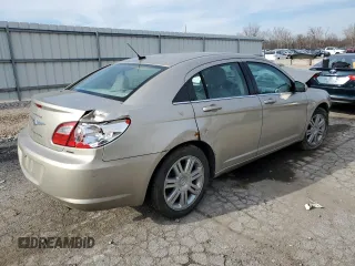 2009 Chrysler Sebring Touring z VIN 1C3LC56D69N544891, wystawiony jako Copart lot #84953594 z przebiegiem Nie podano mil oraz Szkoda całkowita • Salvage title. Historia ofert i sprzedaży dostępna na DreamBid. Obrazek 3.