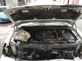 2004 Nissan Titan LE with VIN 1N6AA07B44N512889, listed as a IAAI auction lot 41569019 with 154,655 mi miles. Bid and sale history available at carsss.com. Image 10.