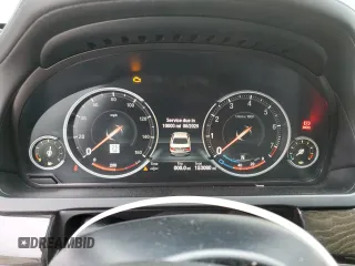 2015 BMW 7 Series 750i z VIN WBAYA8C5XFD825662, wystawiony jako Copart lot #78850474 z przebiegiem 153 080 mil mil oraz Czysty tytuł • Clean title. Historia ofert i sprzedaży dostępna na DreamBid. Obrazek 9.