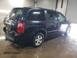 2010 Dodge Grand Caravan SXT with VIN 2D4RN5D15AR140564, listed as a Copart auction lot 52735825 with 187,744 mi miles and Salvage Title. Bid and sale history available at DreamBid. Image 3.