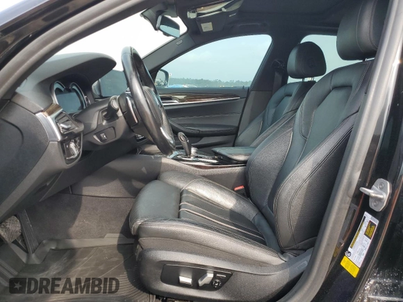 2018 BMW 5 Series 530i with VIN WBAJA5C54JG899845, listed as a Copart auction lot 83007584 with 57,379 mi miles and Salvage Title. Bid and sale history available at DreamBid. Image 7.