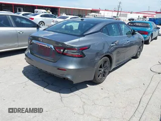 2020 Nissan Maxima SL with VIN 1N4AA6DVXLC373467, listed as a IAAI auction lot 42784055 with 221,014 mi miles and . Bid and sale history available at DreamBid. Image 4.