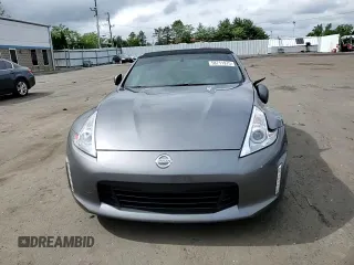 2015 Nissan 370Z Touring z VIN JN1AZ4FH7FM430577, wystawiony jako Copart lot #58711975 z przebiegiem 45 243 mil mil oraz Szkoda całkowita • Salvage title. Historia ofert i sprzedaży dostępna na DreamBid. Obrazek 13.