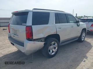 2015 Chevrolet Tahoe LT with VIN 1GNSCBKC9FR111984, listed as a IAAI auction lot 42003685 with 186,391 mi miles and . Bid and sale history available at DreamBid. Image 4.