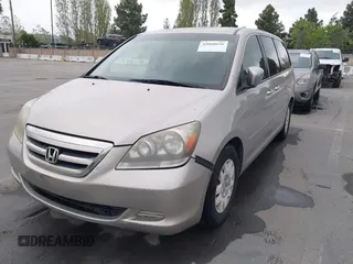 2005 Honda Odyssey LX with VIN 5FNRL38205B026824, listed as a IAAI auction lot 42068656 with 140,914 mi miles. Bid and sale history available at carsss.com. Image 6.