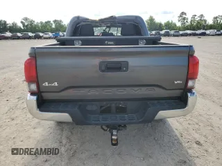 2019 Toyota Tacoma SR z VIN 3TMCZ5AN1KM191177, wystawiony jako Copart lot #56282085 z przebiegiem 110 837 mil mil oraz Szkoda całkowita • Salvage title. Historia ofert i sprzedaży dostępna na DreamBid. Obrazek 6.