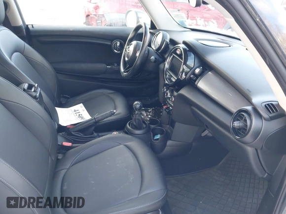 2019 MINI Hardtop Cooper with VIN WMWXP5C52K2H91038, listed as a IAAI auction lot 41509304 with 77,123 mi miles and . Bid and sale history available at DreamBid. Image 5.
