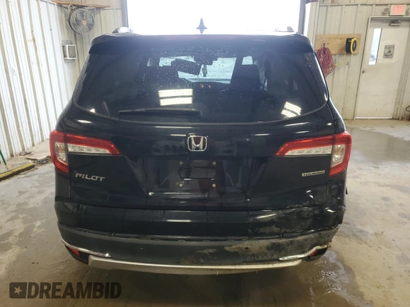 2022 Honda Pilot Touring 7-Passenger z VIN 5FNYF5H68NB029827, wystawiony jako Copart lot #47544715 z przebiegiem 53 657 mil mil oraz Szkoda całkowita • Salvage title. Historia ofert i sprzedaży dostępna na DreamBid. Obrazek 6.