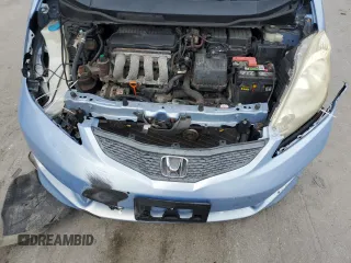 2010 Honda Fit Sport with VIN JHMGE8H64AC032634, listed as a Copart auction lot 61795825 with 143,593 mi miles and Salvage title. Bid and sale history available at DreamBid. Image 11.