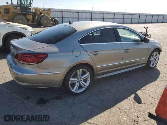 2013 Volkswagen CC R-Line with VIN WVWBP7AN2DE556410, listed as a Copart auction lot 77360244 with 114,891 mi miles and Salvage Title. Bid and sale history available at DreamBid. Image 3.