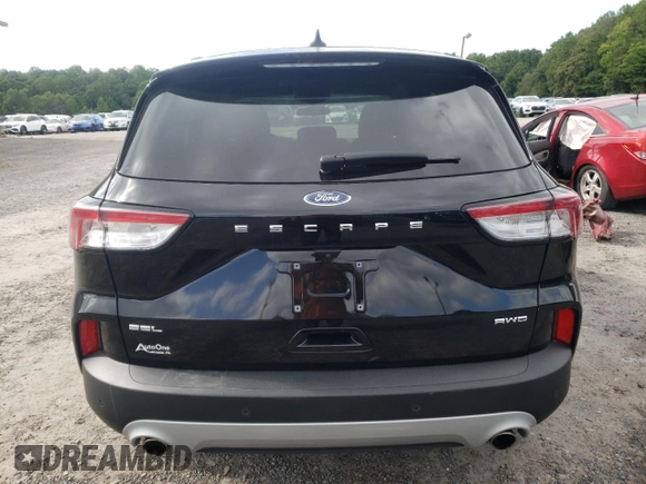 2020 Ford Escape SEL с VIN 1FMCU9H63LUC52655, выставлен на аукционе Copart как лот 64839554 с пробегом 34 404 миль миль и Списание • Salvage title. История ставок и продаж доступна на DreamBid. Изображение 6.