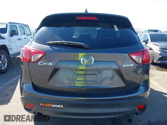 2016 Mazda CX-5 Grand Touring z VIN JM3KE2DYXG0649781, wystawiony jako IAAI lot #41636329 z przebiegiem 83 433 mil mil oraz . Historia ofert i sprzedaży dostępna na DreamBid. Obrazek 16.
