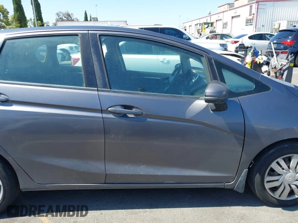 2015 Honda Fit LX with VIN 3HGGK5G54FM731965, listed as a IAAI auction lot 42655355 with 141,205 mi miles and . Bid and sale history available at DreamBid. Image 13.
