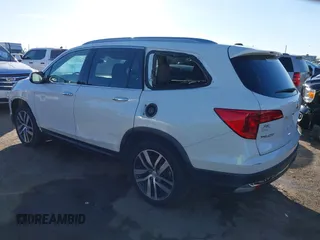 2017 Honda Pilot Touring with VIN 5FNYF6H93HB056387, listed as a IAAI auction lot 41095336 with 90,376 mi miles and . Bid and sale history available at DreamBid. Image 3.