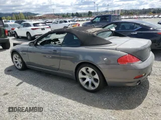 2007 BMW 6 Series 650i z VIN WBAEK13577CN81886, wystawiony jako Copart lot #51362585 z przebiegiem 110 174 mil mil oraz Czysty tytuł • Clean title. Historia ofert i sprzedaży dostępna na DreamBid. Obrazek 2.