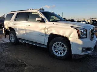 2017 GMC Yukon SLE with VIN 1GKS2AKC1HR371194, listed as a Copart auction lot 89351445 with 125,738 mi miles and Salvage Title. Bid and sale history available at carsss.com. Image 4.