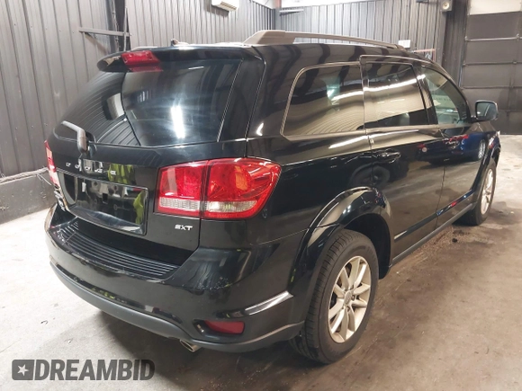 2017 Dodge Journey SXT z VIN 3C4PDDBG2HT658969, wystawiony jako IAAI lot #41878123 z przebiegiem 90 276 mil mil oraz . Historia ofert i sprzedaży dostępna na DreamBid. Obrazek 4.