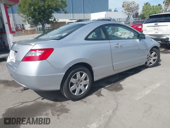 2010 Honda Civic Cpe LX with VIN 2HGFG1B64AH519662, listed as a IAAI auction lot 42006635 with 84,119 mi miles. Bid and sale history available at carsss.com. Image 4.