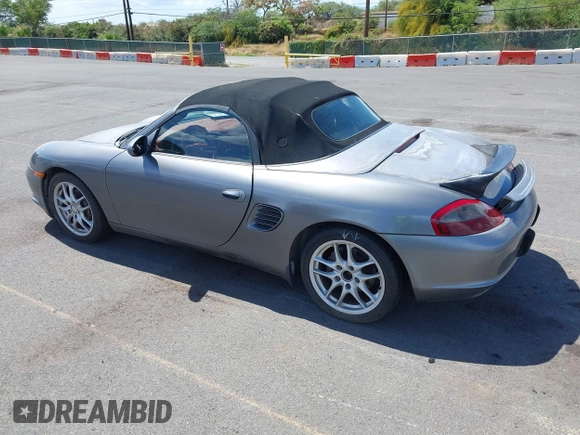2003 Porsche Boxster with VIN WP0CA29893U621152, listed as a IAAI auction lot 42533307 with 70,106 mi miles and . Bid and sale history available at DreamBid. Image 3.