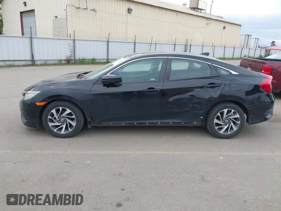 2018 Honda Civic EX with VIN 2HGFC2F75JH583892, listed as a IAAI auction lot 41697605 with 134,675 mi miles and . Bid and sale history available at DreamBid. Image 14.