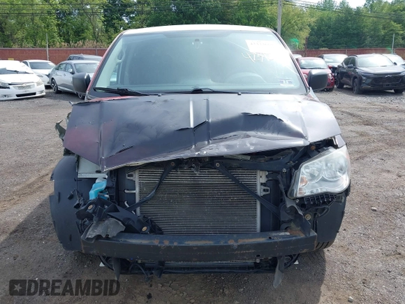 2013 Ram Cargo Van Tradesman with VIN 2C4JRGAG3DR735792, listed as a IAAI auction lot 42342661 with 82,676 mi miles and . Bid and sale history available at DreamBid. Image 12.