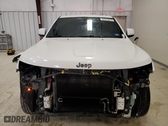 2015 Jeep Grand Cherokee Laredo with VIN 1C4RJFAG5FC150180, listed as a Copart auction lot 87975815 with 130,952 mi miles and Salvage Title. Bid and sale history available at carsss.com. Image 5.