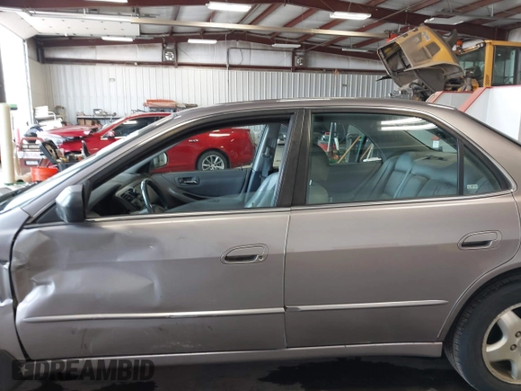 2000 Honda Accord EX z VIN 1HGCG1657YA053433, wystawiony jako IAAI lot #42322643 z przebiegiem 146 517 mil mil oraz . Historia ofert i sprzedaży dostępna na DreamBid. Obrazek 14.