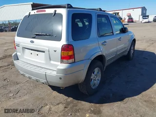 2007 Ford Escape Limited with VIN 1FMYU04197KA67054, listed as a IAAI auction lot 41665928 with 196,706 mi miles. Bid and sale history available at carsss.com. Image 4.