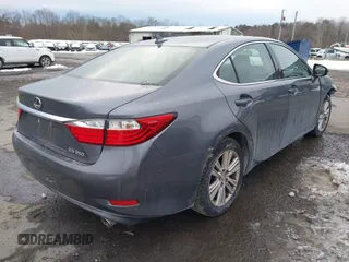 2014 Lexus ES 330 with VIN JTHBK1GG0E2113100, listed as a IAAI auction lot 41309816 with 233,535 mi miles and . Bid and sale history available at DreamBid. Image 4.