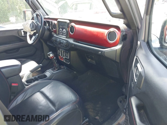 2018 Jeep Wrangler Unlimited Rubicon with VIN 1C4HJXFG6JW267087, listed as a IAAI auction lot 42235058 with 93,962 mi miles and . Bid and sale history available at DreamBid. Image 5.