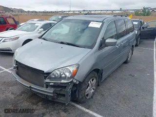 2007 Honda Odyssey Touring with VIN 5FNRL38847B112242, listed as a IAAI auction lot 41772442 with 211,753 mi miles. Bid and sale history available at carsss.com. Image 2.
