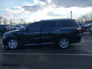 2013 Dodge Durango Crew with VIN 1C4SDJDT9DC538949, listed as a IAAI auction lot 41366816 with 75,675 mi miles. Bid and sale history available at carsss.com. Image 14.