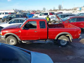 1999 Ford Ranger XLT with VIN 1FTZR15X1XTA90177, listed as a IAAI auction lot 41328368 with 360,832 mi miles. Bid and sale history available at carsss.com. Image 14.