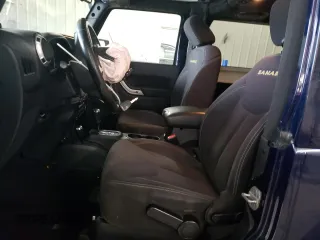 2013 Jeep Wrangler Sahara z VIN 1C4AJWBG4DL504800, wystawiony jako Copart lot #60504575 z przebiegiem 166 687 mil mil oraz Szkoda całkowita • Salvage title. Historia ofert i sprzedaży dostępna na DreamBid. Obrazek 7.