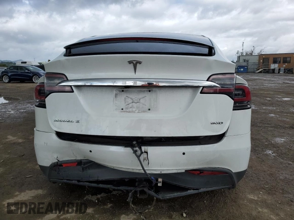2016 Tesla Model X 70D with VIN 5YJXCAE28GF017100, listed as a Copart auction lot 50081235 with 126,962 mi miles and Salvage Title. Bid and sale history available at DreamBid. Image 6.