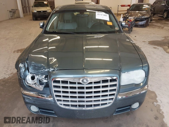 2005 Chrysler 300 with VIN 2C3JA63H95H111269, listed as a IAAI auction lot 41717805 with 102,740 mi miles. Bid and sale history available at carsss.com. Image 12.