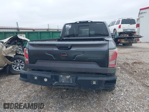 2021 Nissan Titan Pro-4X with VIN 1N6AA1ED3MN531332, listed as a IAAI auction lot 41918065 with 125,323 mi miles and . Bid and sale history available at DreamBid. Image 16.
