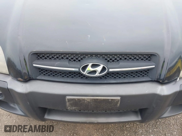 2007 Hyundai Tucson SE with VIN KM8JN12D77U667867, listed as a IAAI auction lot 42082092 with 240,911 mi miles. Bid and sale history available at carsss.com. Image 16.