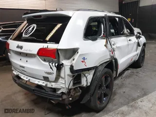 2015 Jeep Grand Cherokee Altitude with VIN 1C4RJFAG7FC932917, listed as a IAAI auction lot 41849526 with 91,827 mi miles. Bid and sale history available at carsss.com. Image 4.