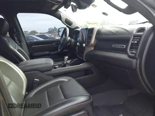 2021 Ram 1500 TRX with VIN 1C6SRFU98MN820577, listed as a IAAI auction lot 42652005 with 43,429 mi miles and . Bid and sale history available at DreamBid. Image 5.