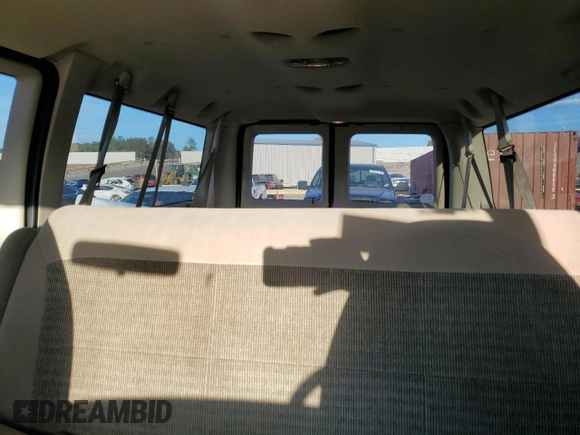 2005 Ford Econoline Passenger XL with VIN 1FBNE31LX5HB07328, listed as a Copart auction lot 80630434 with 173,474 mi miles and Salvage Title. Bid and sale history available at carsss.com. Image 10.