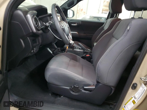 2019 Toyota Tacoma SR z VIN 3TMCZ5AN1KM285074, wystawiony jako Copart lot #53545975 z przebiegiem 53 838 mil mil oraz Szkoda całkowita • Salvage title. Historia ofert i sprzedaży dostępna na DreamBid. Obrazek 7.