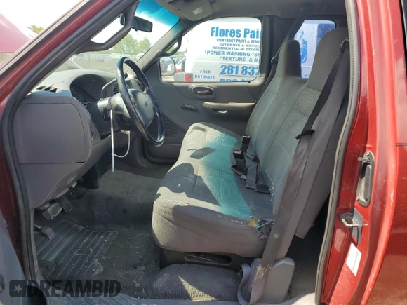 2001 Ford F-150 XL with VIN 1FTZX07261KA62955, listed as a Copart auction lot 56580915 with 159,451 mi miles and Salvage title. Bid and sale history available at DreamBid. Image 7.