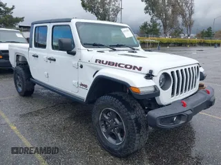 2020 Jeep Gladiator Rubicon with VIN 1C6JJTBG9LL200639, listed as a IAAI auction lot 41787832 with 33,598 mi miles and . Bid and sale history available at DreamBid. Image 1.
