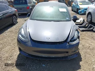 2023 Tesla Model 3 z VIN 5YJ3E1EA2PF569644, wystawiony jako IAAI lot #41831560 z przebiegiem 30 903 mil mil oraz . Historia ofert i sprzedaży dostępna na DreamBid. Obrazek 11.