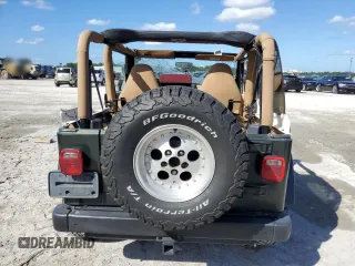 1997 Jeep Wrangler Sahara with VIN 1J4FY49S3VP528462, listed as a Copart auction lot 75415624 with 282,631 mi miles and Non Repairable. Bid and sale history available at carsss.com. Image 6.