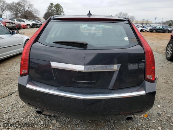 2010 Cadillac CTS Wagon Premium with VIN 1G6DS8EV9A0149235, listed as a Copart auction lot 41517095 with 133,574 mi miles and Salvage Title. Bid and sale history available at carsss.com. Image 6.