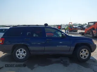 2000 Jeep Grand Cherokee Laredo with VIN 1J4G248S5YC413977, listed as a IAAI auction lot 42045808 with Not provided miles and . Bid and sale history available at DreamBid. Image 13.