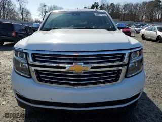 2015 Chevrolet Tahoe LTZ with VIN 1GNSKCKC9FR666040, listed as a Copart auction lot 44431875 with 233,166 mi miles and Salvage Title. Bid and sale history available at carsss.com. Image 5.